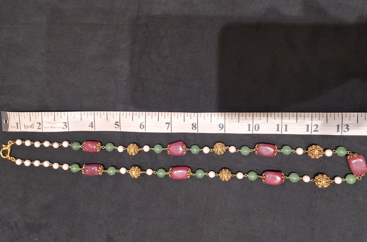 “Pink Stone & Aventurine Necklace Finished with Pearls and Gold Textured Accents”