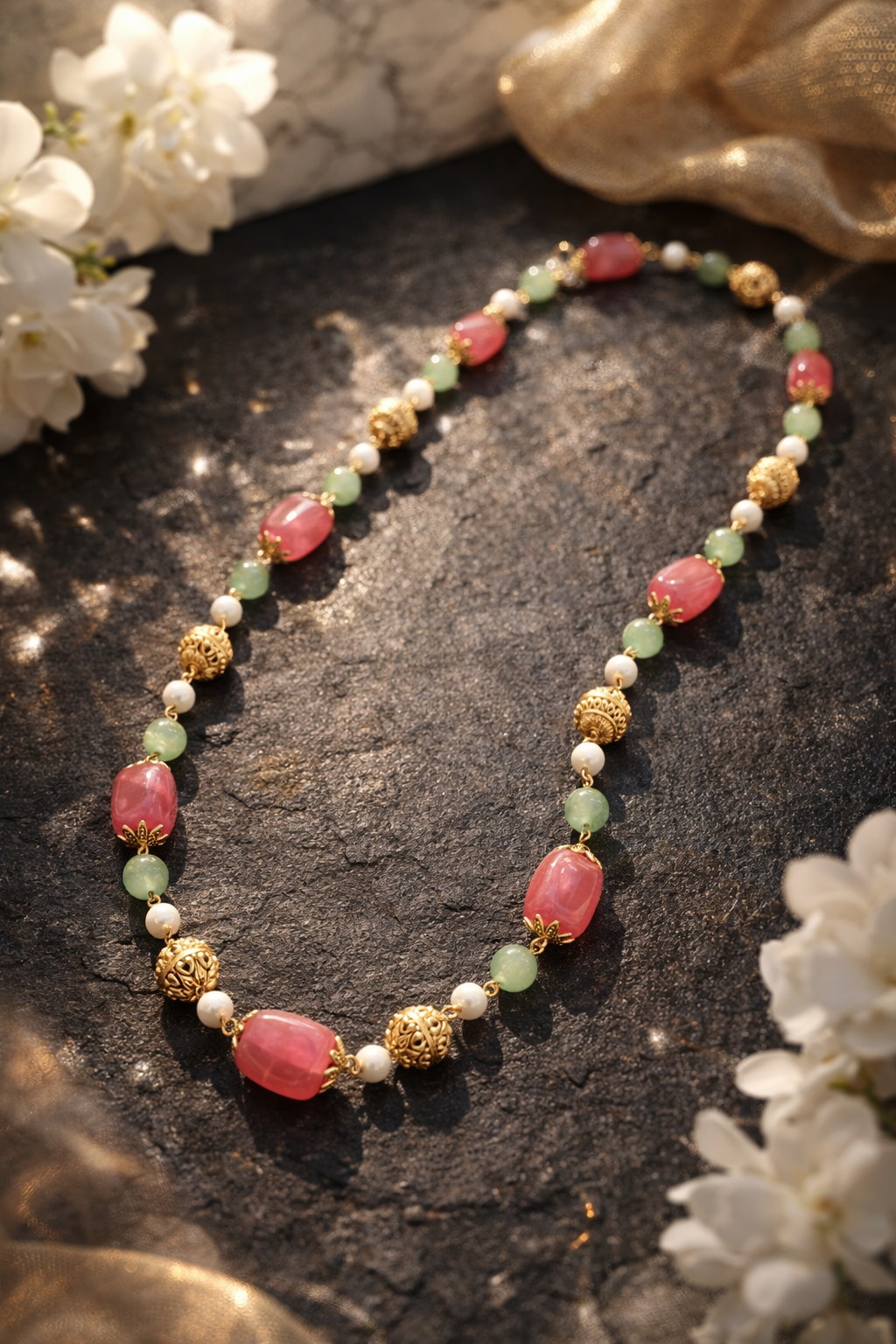 “Pink Stone & Aventurine Necklace Finished with Pearls and Gold Textured Accents”